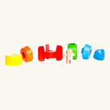 Bajo stacking rocket wooden toy pieces all seperated. 