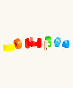 Bajo stacking rocket wooden toy pieces all seperated. 