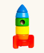 Bajo stacking rocket wooden toy in rainbow colours. 