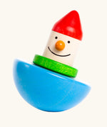 Bajo roly poly wobbling dwarf wooden baby toy. Blue half sphere base that wobbles when pushed with a wooden dwarf character on top from Babipur