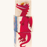 The Bajo Rotary Wooden Blocks Puzzle in a dragon design. The blocks are aligned to show a full dragon illustration
