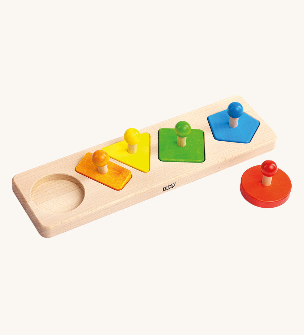 Bajo Figures Sorting Board. A wooden puzzle sorting board toy with different shape peg pieces to place on a wooden base. These heirloom quality toys by Bajo are part of a wide range of wooden toys available here at Babipur. 