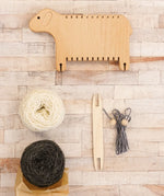 Bajo Weaving Sheep Loom set with a natural wooden loom frame.