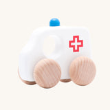 Bajo Small Ambulance wooden toy car. A white painted ambulance with natural wooden wheels. These heirloom quality toys by Bajo are part of a wide range of wooden toys available here at Babipur. 
