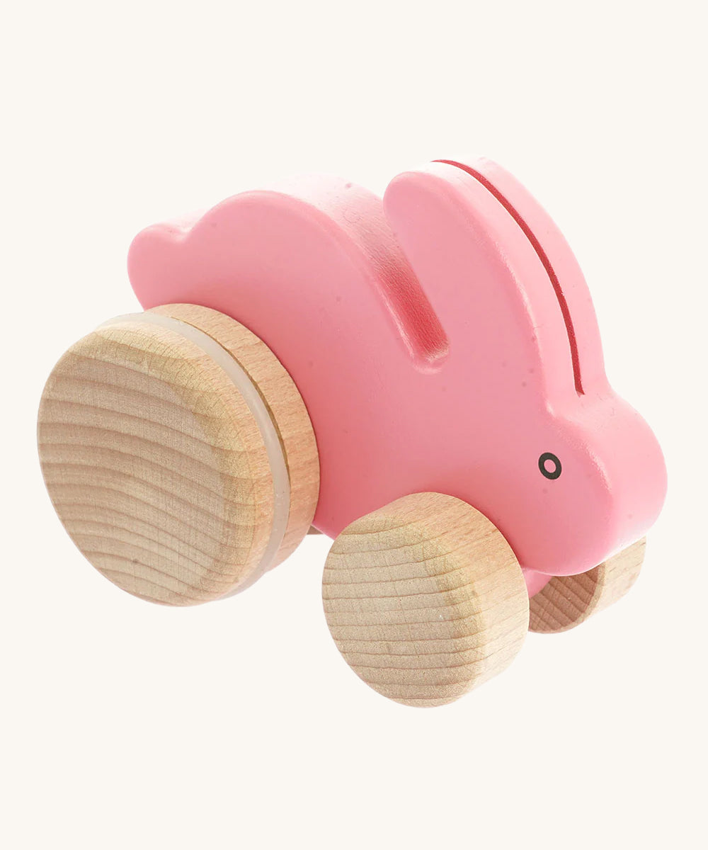 Bajo Pink Small wooden Rabbit toy on wheels. These small wooden rabbits are part of a wide range of wooden toys available at Babipur. 