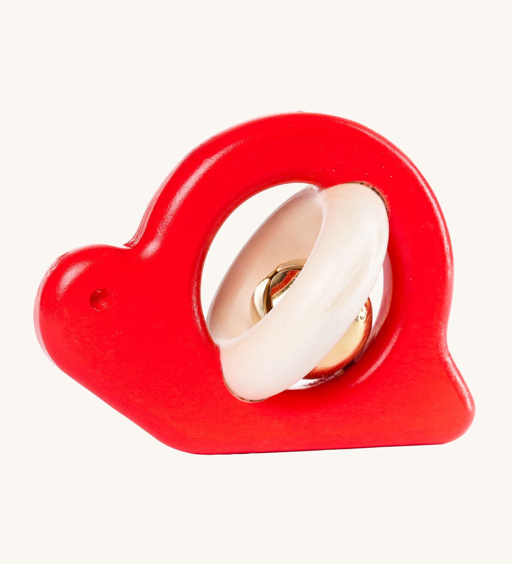 Bajo Snail Rattle baby toy. A red coloured Bajo snail baby toy. A red coloured snail with a bell detail.