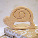 Bajo wooden toys snail baby teether. These heirloom quality toys by Bajo are part of a wide range of wooden toys available here at Babipur. 