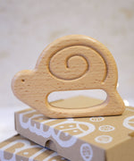 Bajo wooden toys snail baby teether. These heirloom quality toys by Bajo are part of a wide range of wooden toys available here at Babipur. 