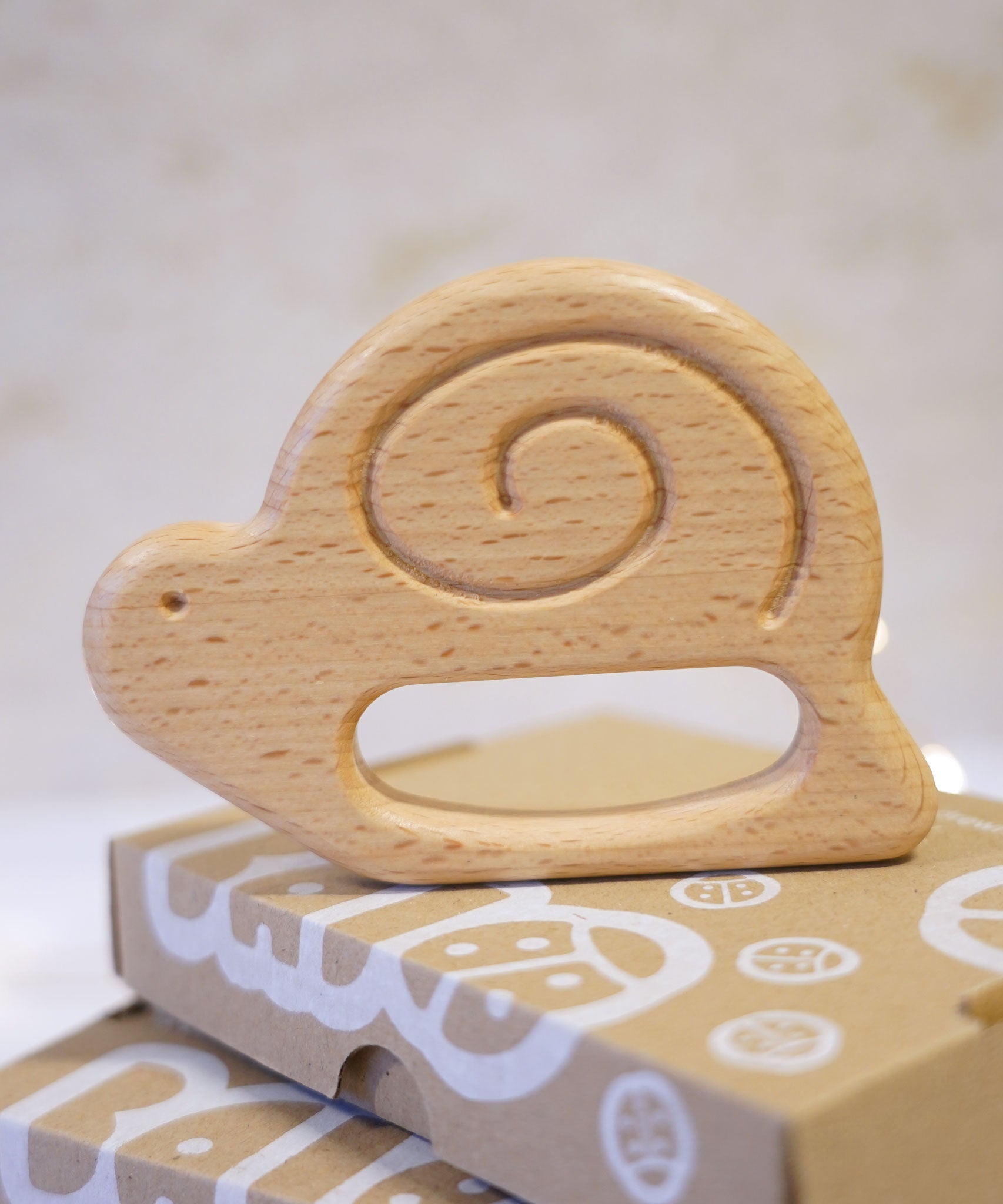 Bajo wooden toys snail baby teether. These heirloom quality toys by Bajo are part of a wide range of wooden toys available here at Babipur. 