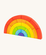 Bajo kids wooden rainbow toy blocks set stacked up on a white background