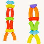 2 colourful towers made from Bajo plastic-free wooden rainbow toy blocks