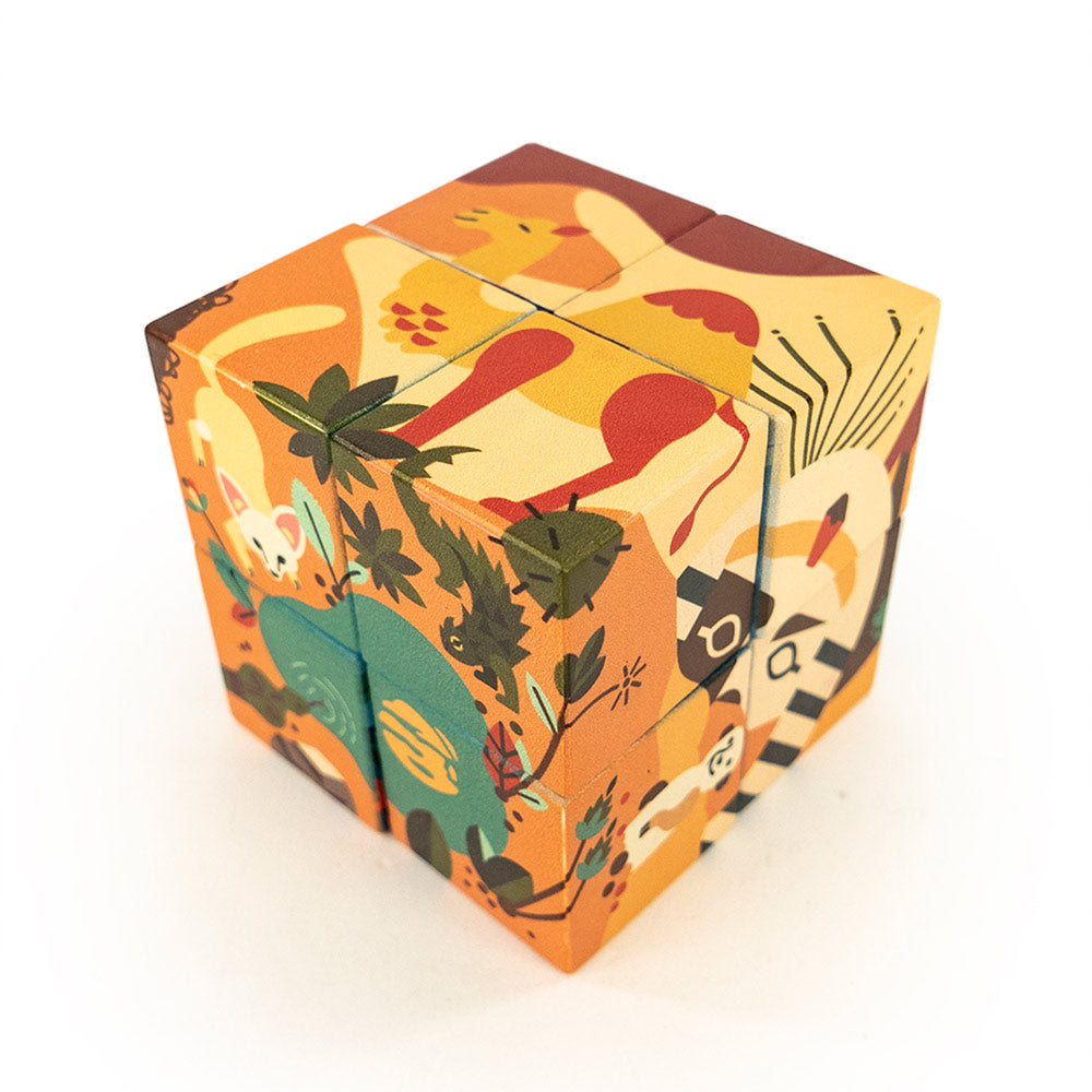 Bajo sustainable wooden reef and desert block puzzle stacked in a cube on a white background