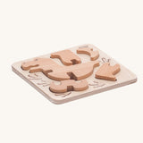 Bajo t-rex dinosaur wooden puzzle and sorter toy. These heirloom quality toys by Bajo are part of a wide range of wooden toys available here at Babipur. 