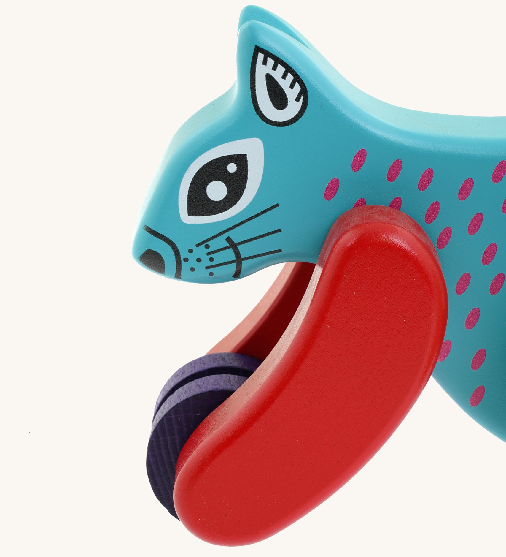 A close up of the Bajo x Tobe blue wooden jumping squirrel toy available at Babipur. Showing the cute painted face and wheels on the front 