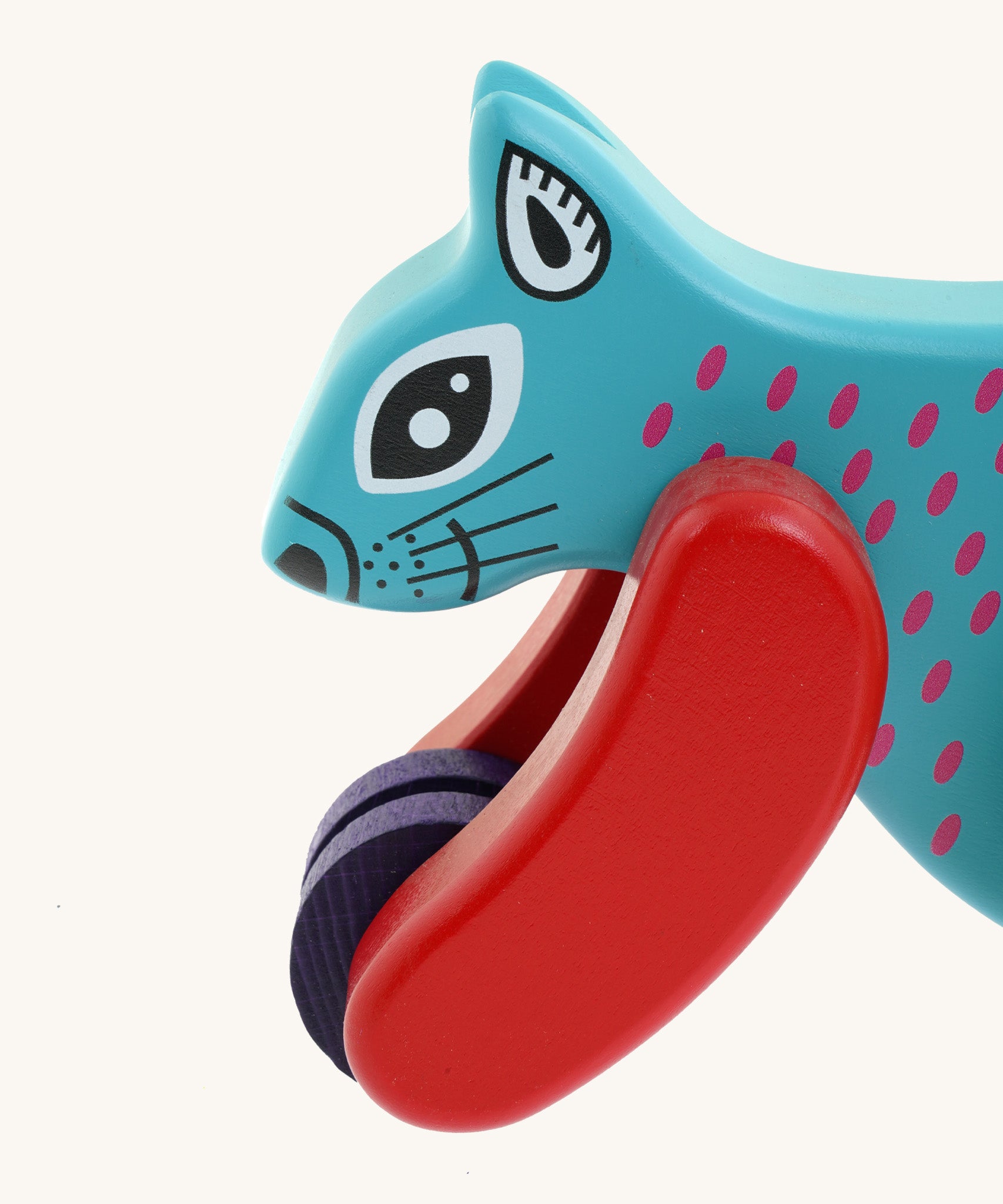 A close up of the Bajo x Tobe blue wooden jumping squirrel toy available at Babipur. Showing the cute painted face and wheels on the front 