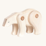 A white Tobe wooden polar bear toy. This polar bear figure has movable joints. A range of Tobe animals are available at Babipur. 