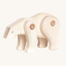 A white Tobe wooden polar bear toy. This polar bear figure has movable joints. A range of Tobe animals are available at Babipur. 