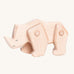 A Tobe wooden rhinoceros figure toy with movable legs. We have a range of Tobe animal figures available at Babipur. 