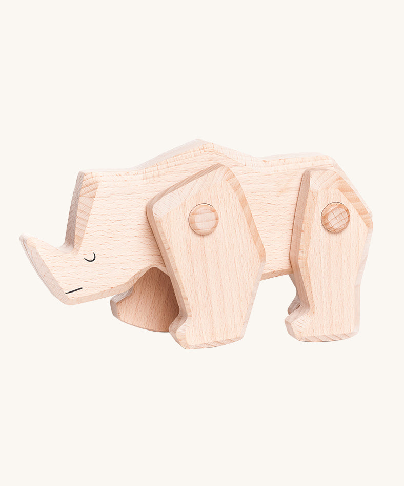 A Tobe wooden rhinoceros figure toy with movable legs. We have a range of Tobe animal figures available at Babipur. 
