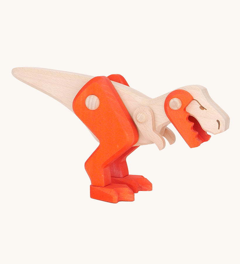 Tobe Extinct Animals T-Rex. A natural wooden dinosaur figure with orange coloured legs and lower jaw. These heirloom quality toys by Bajo are part of a wide range of wooden toys available here at Babipur. 