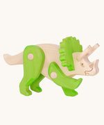 Tobe Extinct Animals Triceratops wooden toy figure. A natural wooden body with green coloured legs and headdress details. These heirloom quality toys by Bajo are part of a wide range of wooden toys available here at Babipur. 