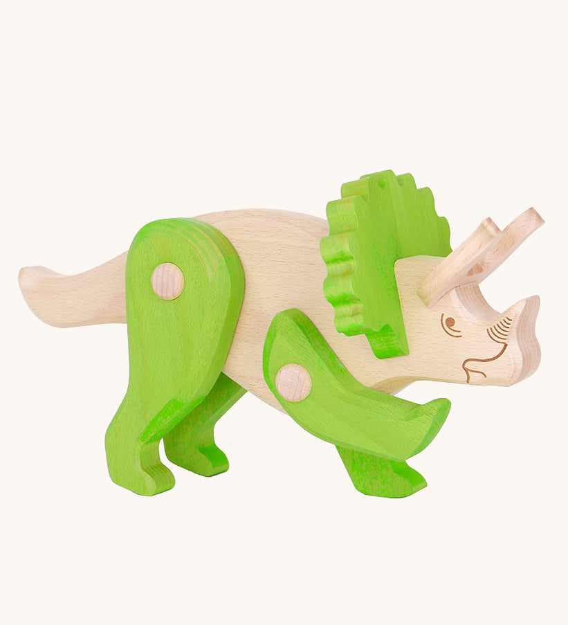 Tobe Extinct Animals Triceratops wooden toy figure. A natural wooden body with green coloured legs and headdress details. These heirloom quality toys by Bajo are part of a wide range of wooden toys available here at Babipur. 