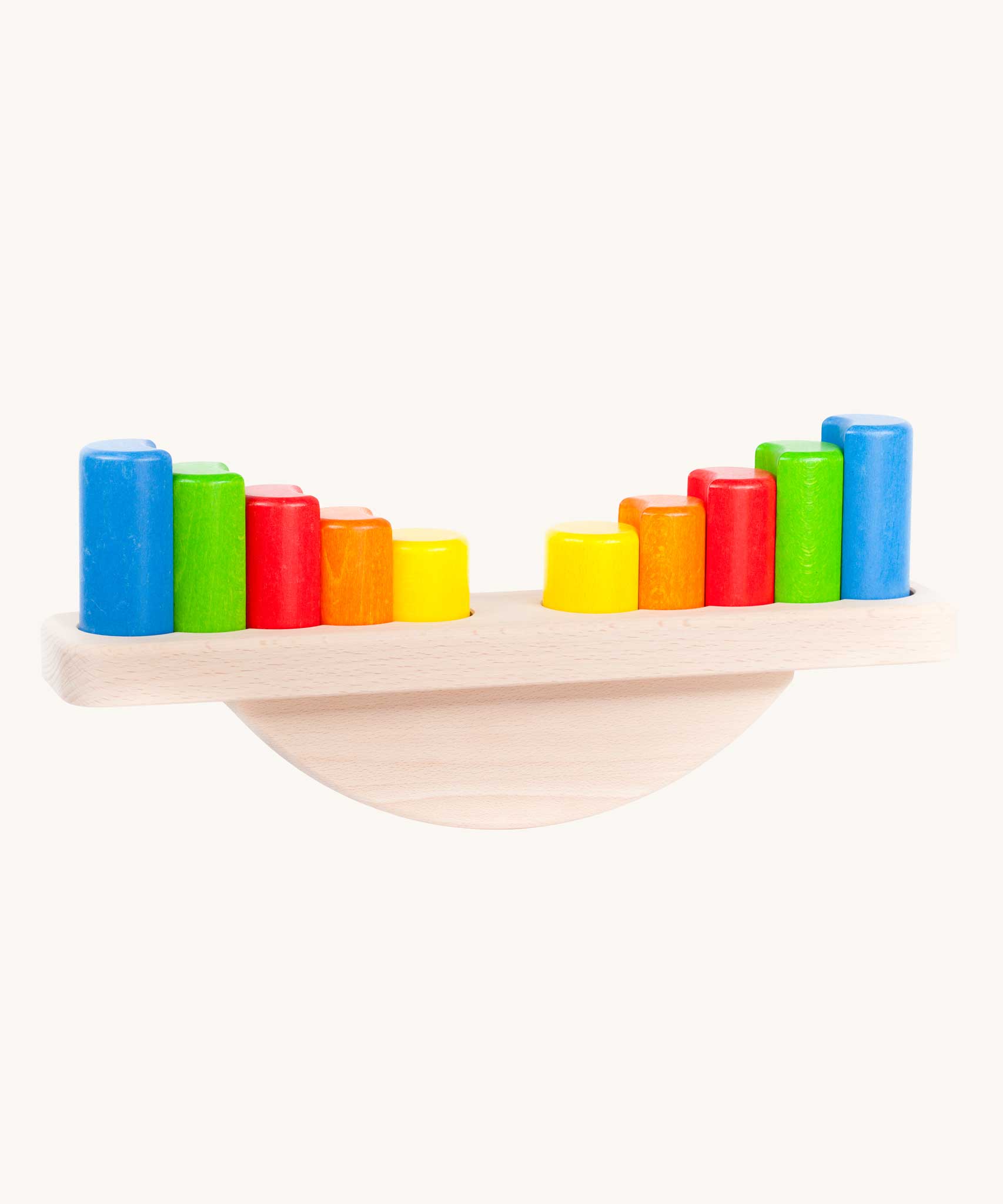 Bajo Balance Scale wooden toy. A wooden base with a curved base with coloured wooden blocks that sit on top. These heirloom quality toys by Bajo are part of a wide range of wooden toys available here at Babipur.