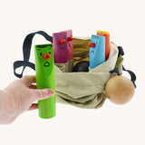 Bajo Fellow Skittles wooden toy game. Six coloured wooden skittles decorated with faces with red noses. The set comes with two wooden balls.  These heirloom quality toys by Bajo are part of a wide range of wooden toys available here at Babipur.