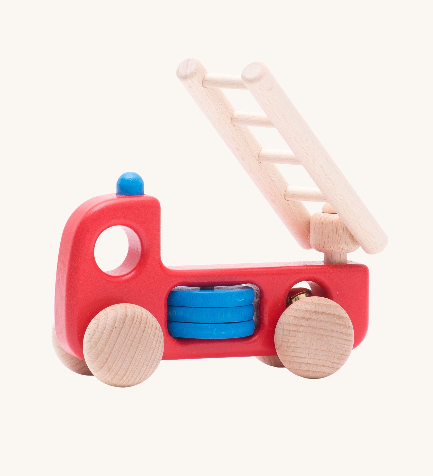 Bajo Fire Engine wooden toy vehicle. A red body truck with blue details on the body and roof with a natural wooden ladder and wheels.