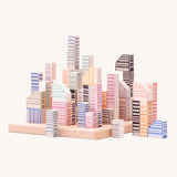 Bajo Manhattan city Blocks wooden toy blocks on a wooden base.