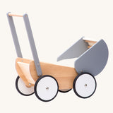 Children's Bajo Monochrome wooden Doll's Pram. A natural wooden and grey painted toy pram with large wheels.