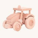 A wooden toy tractor built from the Bajo DIY Tractor kit. These heirloom quality toys by Bajo are part of a wide range of wooden toys available here at Babipur. 