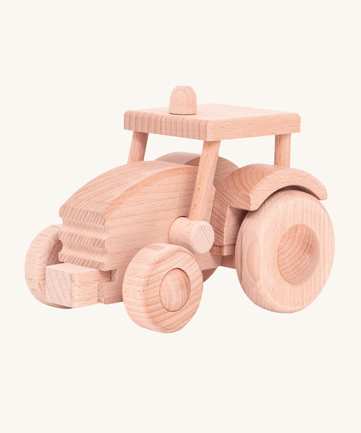 A wooden toy tractor built from the Bajo DIY Tractor kit. These heirloom quality toys by Bajo are part of a wide range of wooden toys available here at Babipur. 
