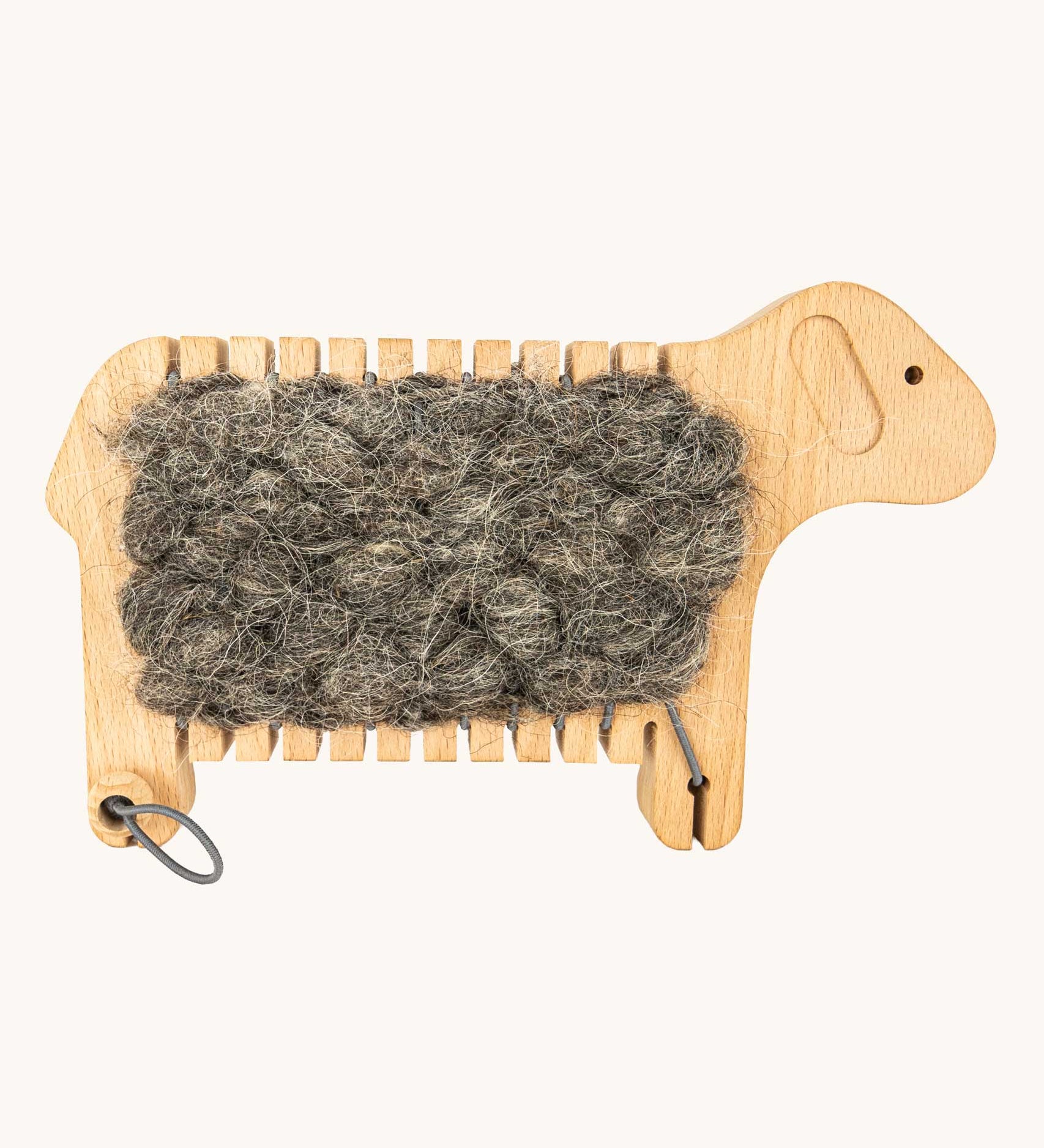 Bajo Weaving Sheep Loom in a Natural wood. The set contains all that you need to create your very  own wooly sheep.