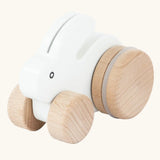 Bajo small white rabbit push along toy. White painted bunny rabbit on natural wooden wheels.