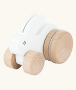Bajo small white rabbit push along toy. White painted bunny rabbit on natural wooden wheels.