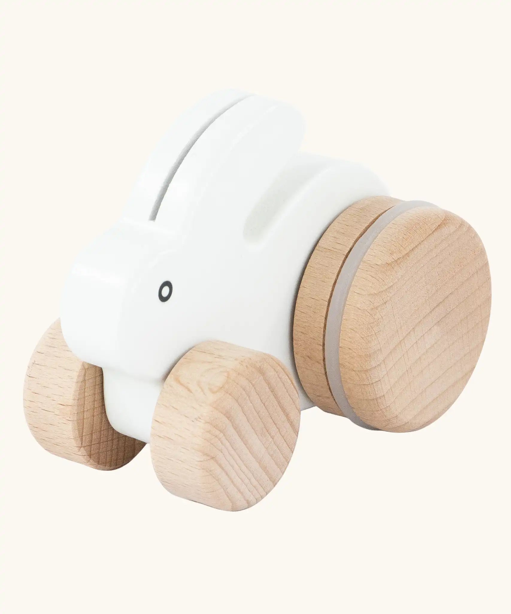 Bajo small white rabbit push along toy. White painted bunny rabbit on natural wooden wheels.