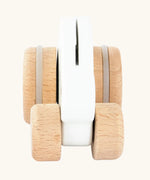 Front view of Bajo small white rabbit push along toy.