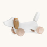 Bajo wooden white dachshund puppy available at Babipur. Features unpainted wheels to push and pull