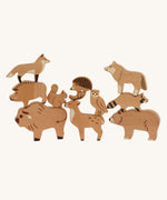 Bajo Wild Animals Forest Set. A set of wooden forest animal figures stacked on top of each other and include: Fox, Wolf, Bison, Squirrel, Deer, Hog, Hedgehog, Owl, Raccoon and Bear. These heirloom quality toys by Bajo are part of a wide range of wooden toys available here at Babipur.