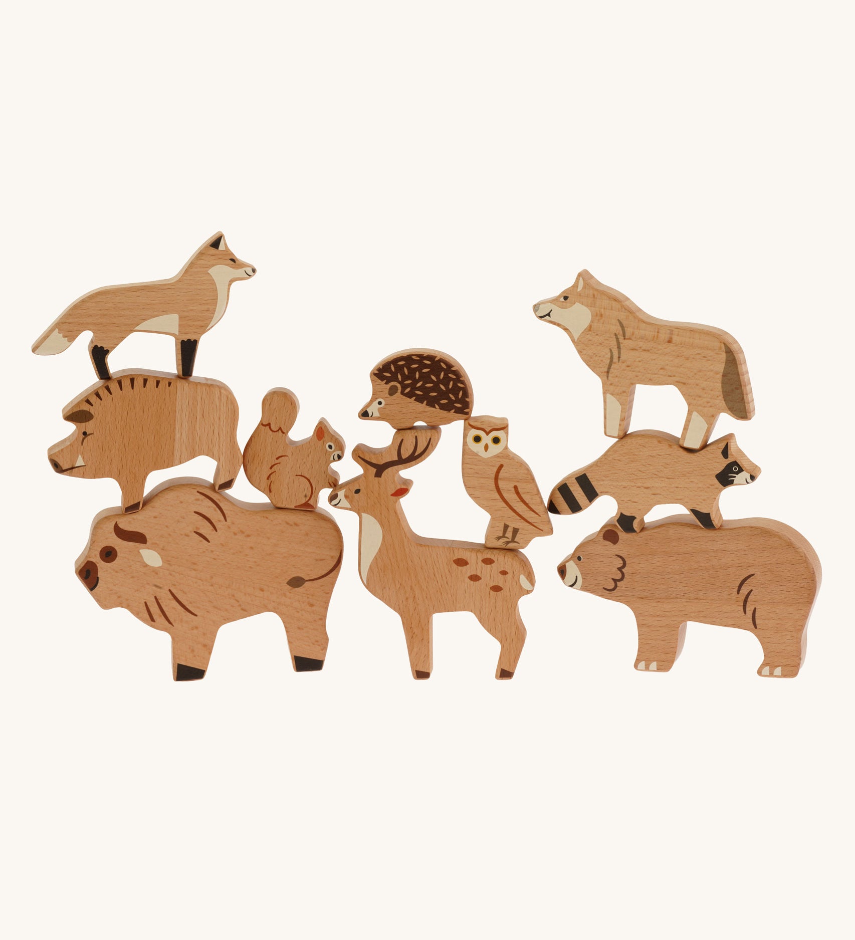 Bajo Wild Animals Forest Set. A set of wooden forest animal figures stacked on top of each other and include: Fox, Wolf, Bison, Squirrel, Deer, Hog, Hedgehog, Owl, Raccoon and Bear. These heirloom quality toys by Bajo are part of a wide range of wooden toys available here at Babipur.