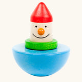 Bajo roly poly wobbling dwarf wooden baby toy. Blue half sphere base that wobbles when pushed with a wooden dwarf character on top from Babipur.