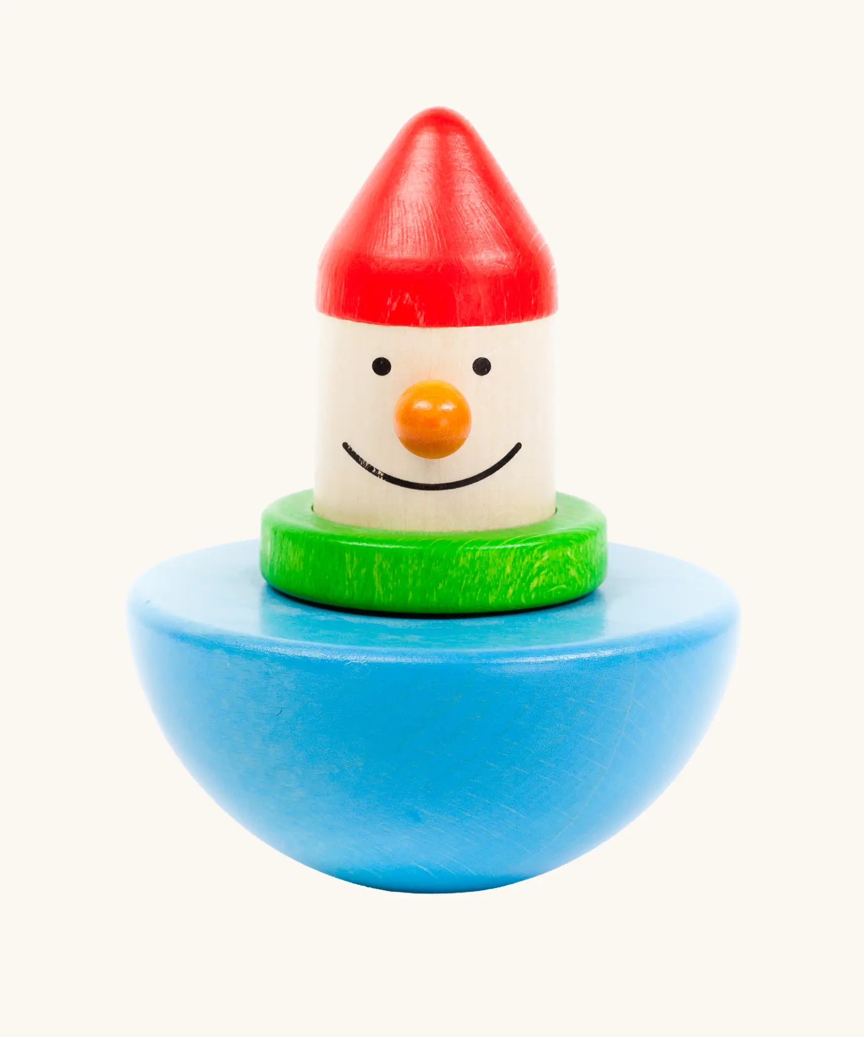 Bajo roly poly wobbling dwarf wooden baby toy. Blue half sphere base that wobbles when pushed with a wooden dwarf character on top from Babipur.