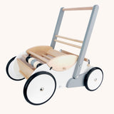 Bajo Monochrome Baby Walker. A wooden push along baby walker with natural wood, white, grey and black details. These heirloom quality toys by Bajo are part of a wide range of wooden toys available here at Babipur. 
