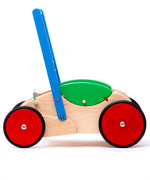 Bajo wooden Baby Walker. A natural wooden walker with red and blue details and red wheels. These heirloom quality toys by Bajo are part of a wide range of wooden toys available here at Babipur. 