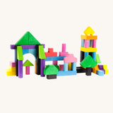 Bajo 102 Blocks. A tub of 102 wooden toy building blocks. The blocks have been used to create a building and a tower structure. These heirloom quality toys by Bajo are part of a wide range of wooden toys available here at Babipur. 