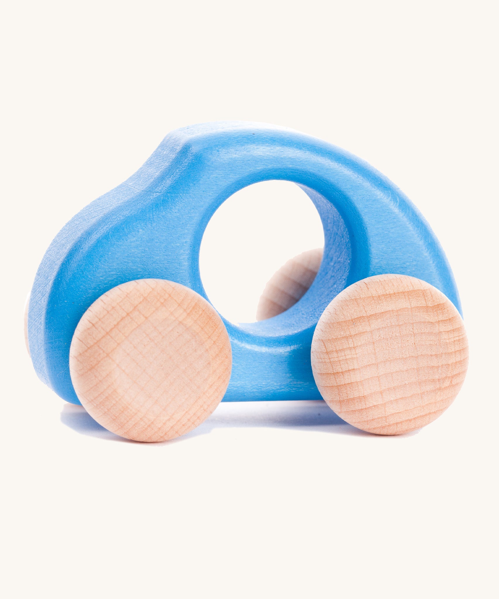 Bajo handmade wooden beetle style car in blue and available at Babipur features unpainted wheels, can be pushed or pulled along.