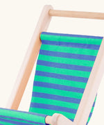 Close up of the blue and white stripe cotton on the Bajo wooden doll stroller toy.
