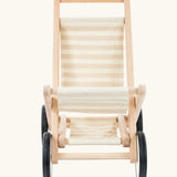 Front on view of the Bajo wooden doll stroller toy with a cream and natural stripe cotton seat and shelf, white wooden wheels with black rubber trims. 