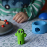Close up of the green alien figure from the Bajo Alien Flying Saucer.
